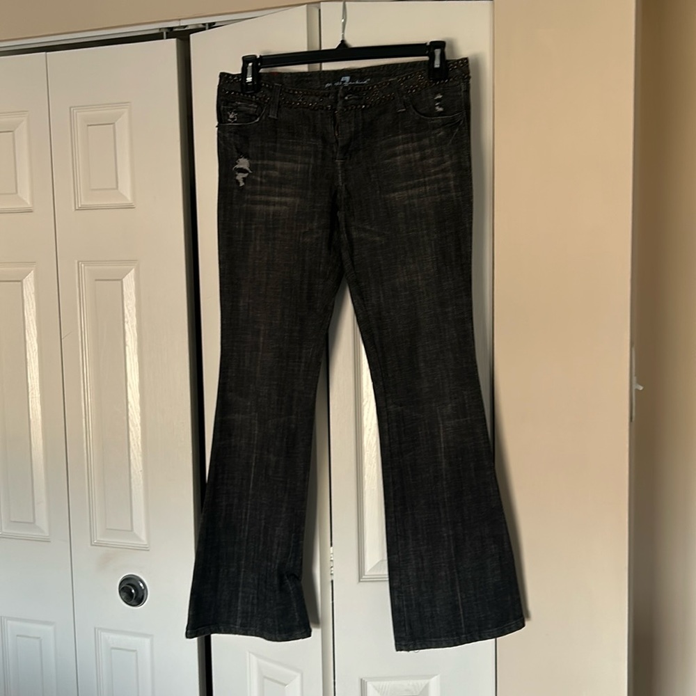 Jeans with studs at waste band